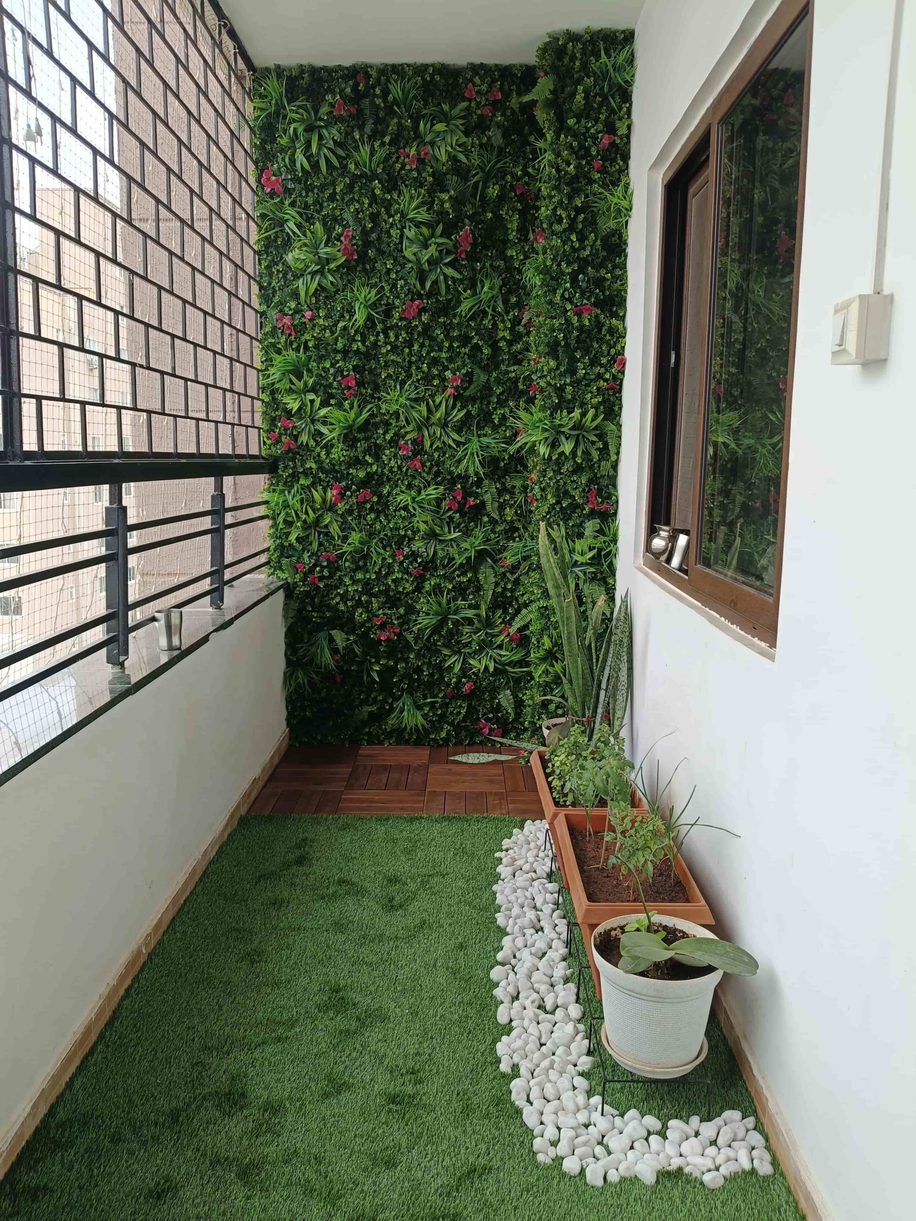 Lush Balcony Green Wall with Mixed Foliage